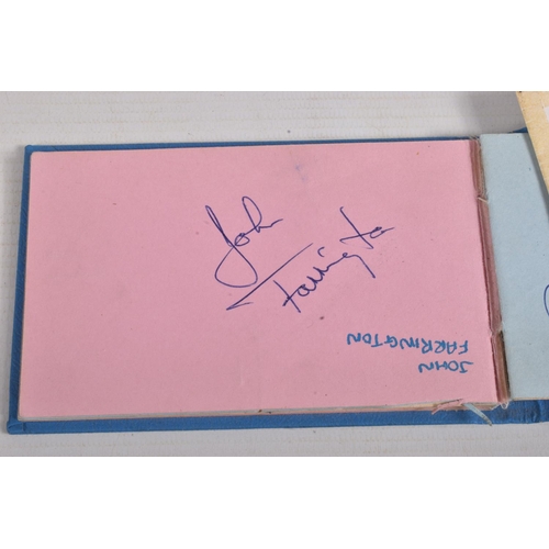 21 - A NUMBER OF SPORTING AUTOGRAPHS, an autograph book signed by various footballers such as Paddy Buckl... 