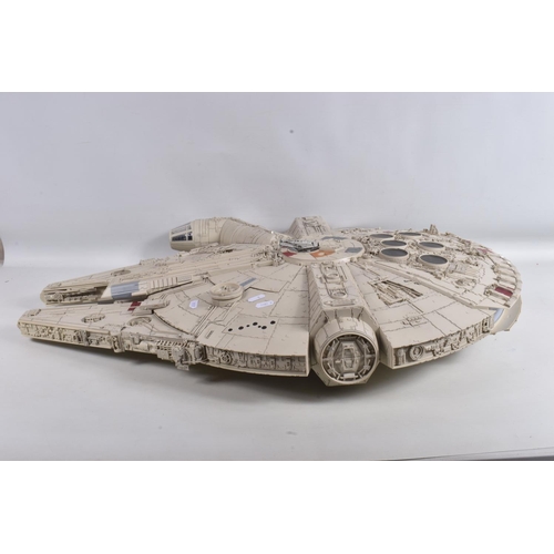 25 - A CONSTRUCTED MODEL OF THE STAR WARS MILLENNIUM FALCON, believed to be from the De Agostini partwork... 