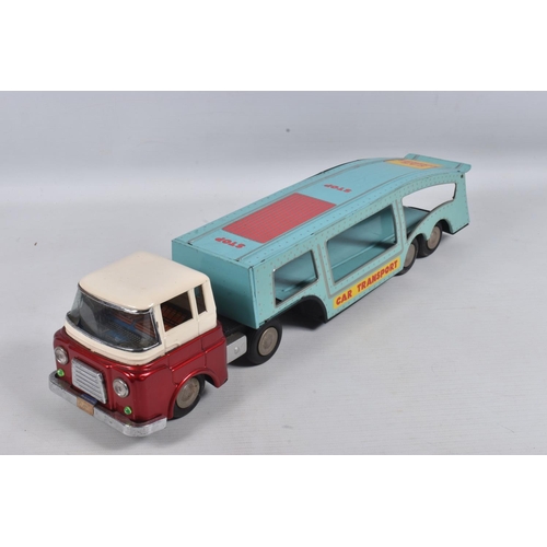 47 - A BOXED CHINESE MADE FRICTION DRIVE TINPLATE ARTICULATED CAR CARRIER/TRANSPORTER, c.1960's, appears ... 