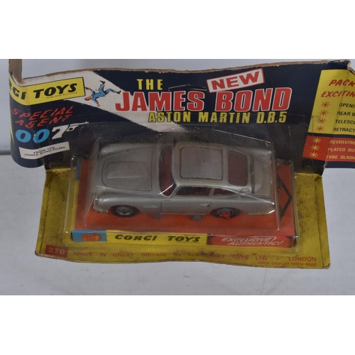 49 - A BOXED CORGI TOYS JAMES BOND ASTON MARTIN D.B.5, No.270, appears complete with all working features... 