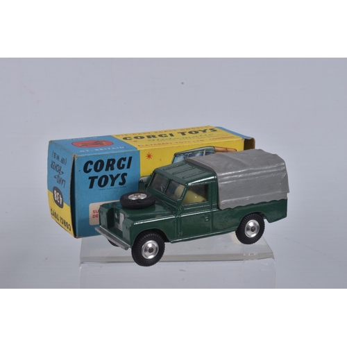 53 - A BOXED CORGI TOYS 109   WB LAND ROVER, No.438, green body, yellow interior, grey canopy, metal hook... 