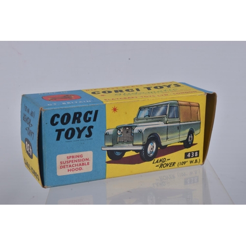 53 - A BOXED CORGI TOYS 109   WB LAND ROVER, No.438, green body, yellow interior, grey canopy, metal hook... 