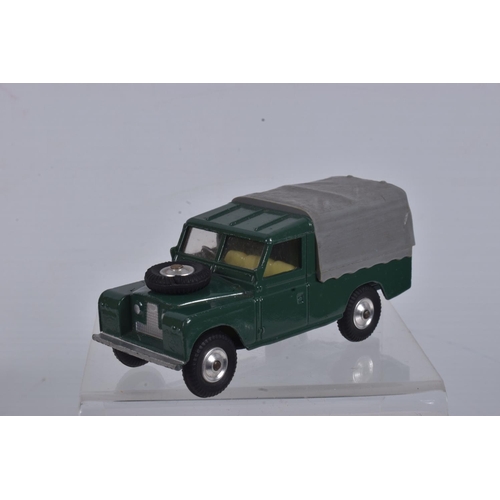 53 - A BOXED CORGI TOYS 109   WB LAND ROVER, No.438, green body, yellow interior, grey canopy, metal hook... 