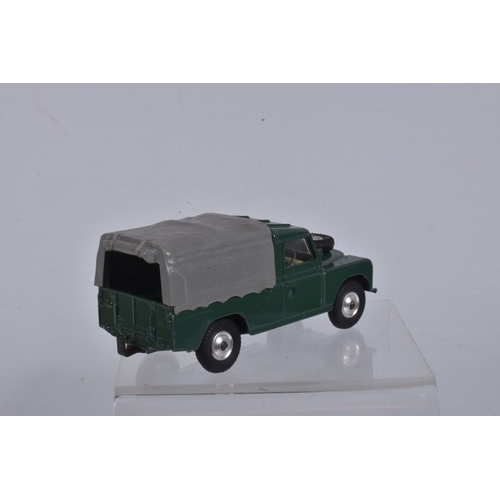 53 - A BOXED CORGI TOYS 109   WB LAND ROVER, No.438, green body, yellow interior, grey canopy, metal hook... 