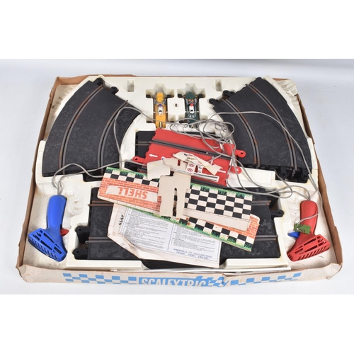 100 - A BOXED SCALEXTRIC GRAND PRIX SET 50, contents not checked but appears largely complete, with both c... 