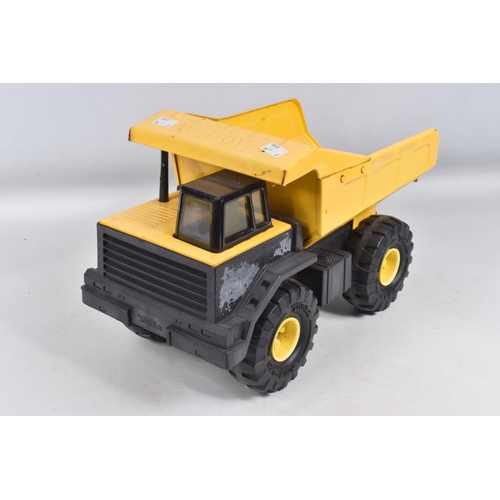 109 - THREE MIGHTY TONKA TOYS DUMPER TRUCKS, three are the later versions with plastic chassis, with a sim... 