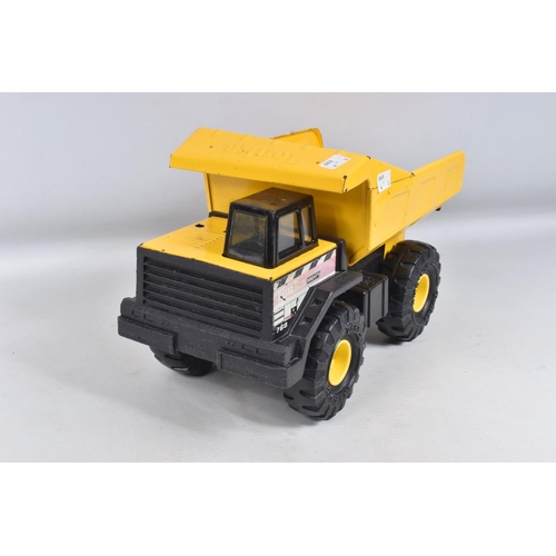 109 - THREE MIGHTY TONKA TOYS DUMPER TRUCKS, three are the later versions with plastic chassis, with a sim... 