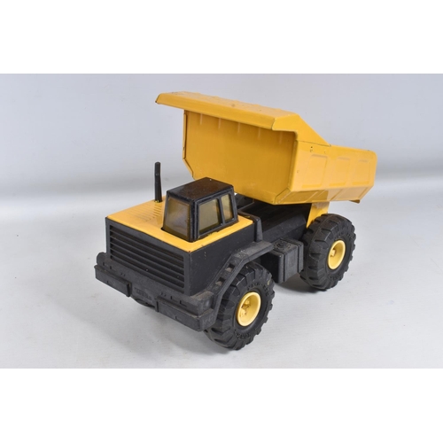 109 - THREE MIGHTY TONKA TOYS DUMPER TRUCKS, three are the later versions with plastic chassis, with a sim... 