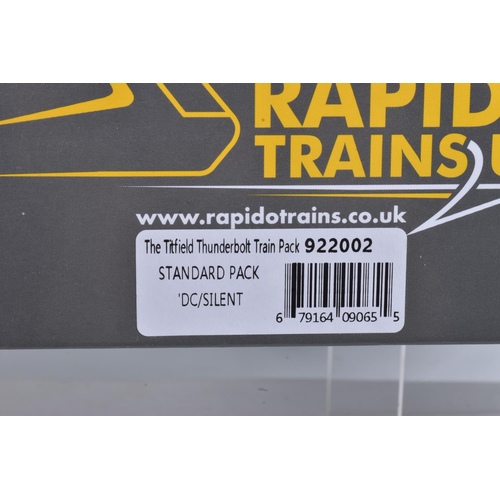 123 - A COLLECTION OF BOXED  RAPIDO TRAINS UK OO GAUGE RAILWAY SETS, to include a Wagon Triple Pack 'Inspi... 