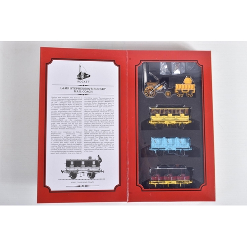 125 - A BOXED OO GAUGE HORNBY ROYAL MAIL TRAIN PACK,  L&MR Stephenson's Rocket Royal Mail Coach 4 Pack, no... 