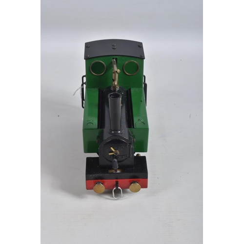 159 - AN UNBOXED MSS LIVE STEAM 0-4-0 LOCOMOTIVE AND TENDER, green and black livery with gold lining, not ... 