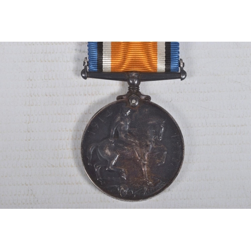 210 - A WWI CASUALTY PAIR OF MEDALS AND MEMORIAL PLAQUE, the medals are named to 102477 Private H Guest M.... 