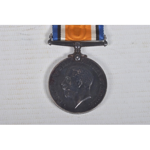 210 - A WWI CASUALTY PAIR OF MEDALS AND MEMORIAL PLAQUE, the medals are named to 102477 Private H Guest M.... 