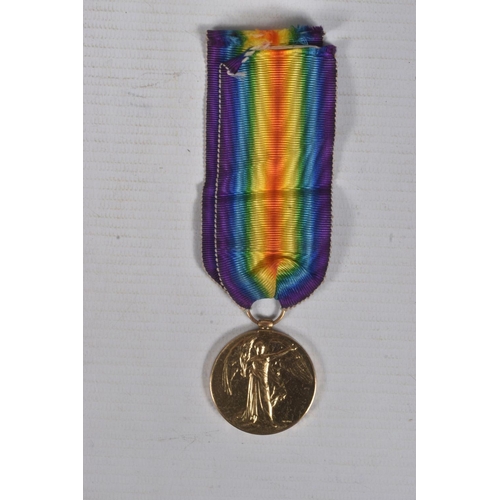 210 - A WWI CASUALTY PAIR OF MEDALS AND MEMORIAL PLAQUE, the medals are named to 102477 Private H Guest M.... 