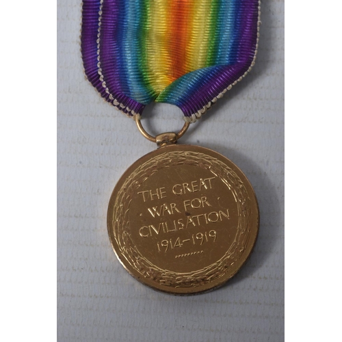 210 - A WWI CASUALTY PAIR OF MEDALS AND MEMORIAL PLAQUE, the medals are named to 102477 Private H Guest M.... 