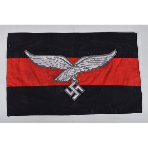 211 - A GERMAN LUFTWAFFE STANDARD FLAG, this has an eagle on a Swastika sewn on to a black and red flag