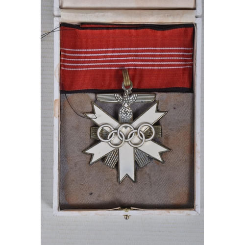 212 - A BOXED 1936 MUNICH OLYMPICS NECK AWARD, these awards were usually given to administrators who worke... 