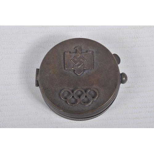 214 - A GERMAN 1936 MUNICH OLYMPICS SNUFF BOX, this has an Eagle and a Swastika plus the Olympic Rings on ... 