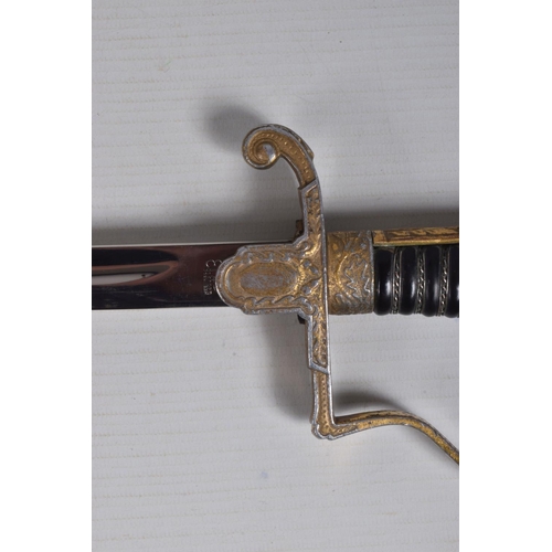 235 - A GERMAN THIRD REICH OFFICERS SWORD MADE BY EICKHORN, this has a gilt aluminium hilt and an eagle on... 