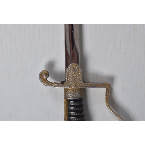 235 - A GERMAN THIRD REICH OFFICERS SWORD MADE BY EICKHORN, this has a gilt aluminium hilt and an eagle on... 