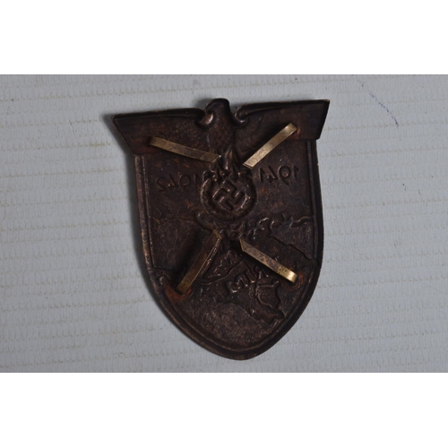 248 - A SMALL COLLECTION OF WWII OR LATER UNITED STATES of AMERICA  MARINES BADGES along with a German Iro... 