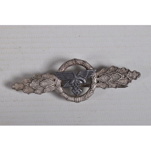 252 - A GERMAN LUFTWAFFE TRANSPORT CLASP IN BRONZE, the pin and clasp are in working order but the pin is ... 