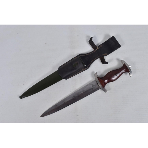 273 - A GERMAN THIRD REICH NPEA DAGGER WITH SCABBARD, this has a double edged blade with the motto Mehr se... 