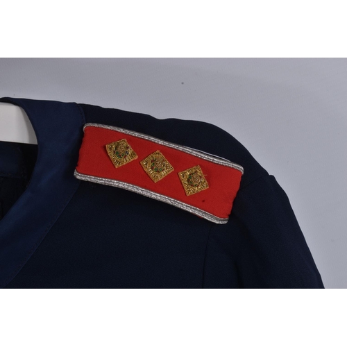 278 - A MODERN QUEEN ALEXANRAS ROYAL ARMY NURSING CORP DRESS UNIFORM and a stable belt, the uniform consis... 