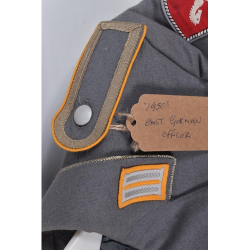 282 - TWO 1950's OR LATER GERMAN MILITARY OFFICERS JACKETS, the first jacket is grey in colour and on the ... 