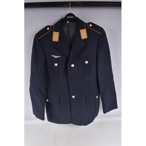 282 - TWO 1950's OR LATER GERMAN MILITARY OFFICERS JACKETS, the first jacket is grey in colour and on the ... 