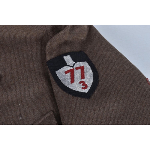 285 - A WWII GERMAN RAD HAUPTAMTSWALTER TUNIC, this jacket retains its bullion collar tabs and shoulder ep... 