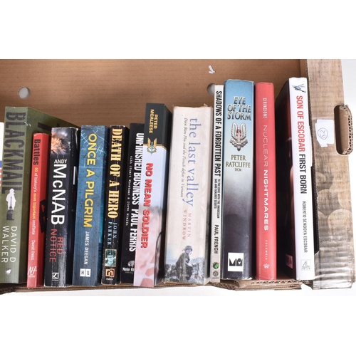 296 - A BOX OF MILITARY RELATED BOOKS BOTH HARD & SOFTBACK, together with four signed photos by Peter McAl... 