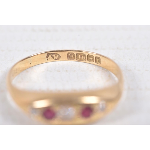 303 - AN 18CT GOLD RUBY AND DIAMOND BOAT RING, set with three old cut diamonds interspaced with two circul... 