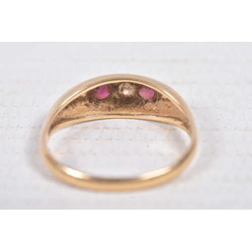 303 - AN 18CT GOLD RUBY AND DIAMOND BOAT RING, set with three old cut diamonds interspaced with two circul... 