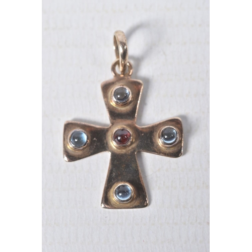 312 - A YELLOW METAL GEM SET CROSS PENDANT, polished cross set with a central garnet cabochon and four top... 