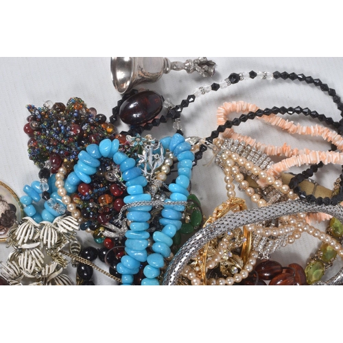 319 - A LARGE BAG OF ASSORTED COSTUME JEWELLERY AND ITEMS, to include mid to late 20th century paste neckl... 