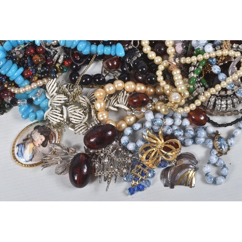 319 - A LARGE BAG OF ASSORTED COSTUME JEWELLERY AND ITEMS, to include mid to late 20th century paste neckl... 