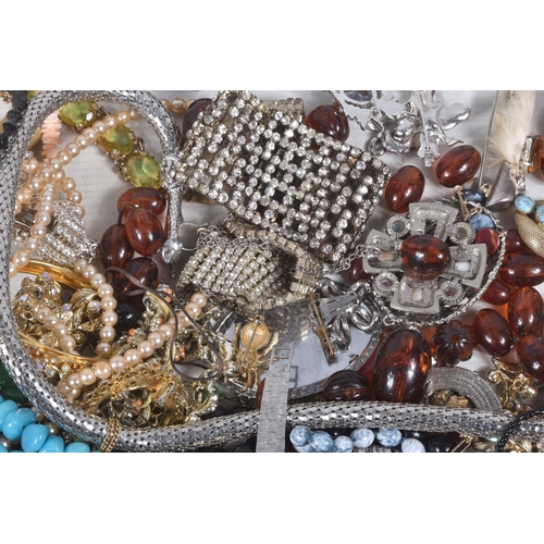 319 - A LARGE BAG OF ASSORTED COSTUME JEWELLERY AND ITEMS, to include mid to late 20th century paste neckl... 