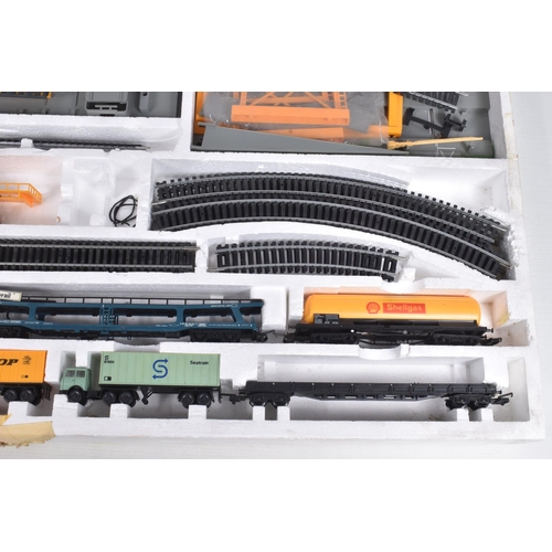 174 - TWO BOXED LIMA HO GAUGE FREIGHT TRAIN SETS, Multi Traffic, No.107309TW, missing original locomotive ... 