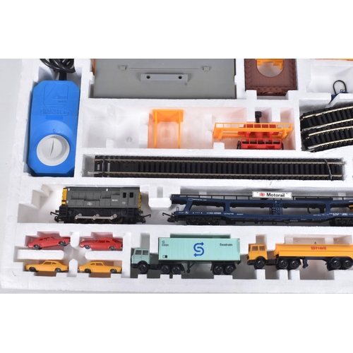 174 - TWO BOXED LIMA HO GAUGE FREIGHT TRAIN SETS, Multi Traffic, No.107309TW, missing original locomotive ... 