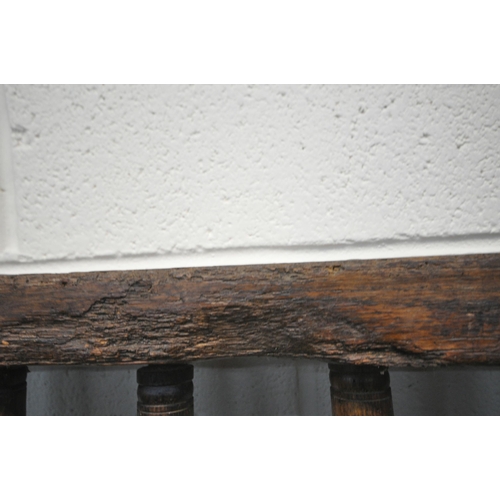 152 - A CATTLE TROUGH, with various alterations and timbers, later legs, with a cattle guard, length 202cm... 