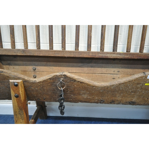 152 - A CATTLE TROUGH, with various alterations and timbers, later legs, with a cattle guard, length 202cm... 