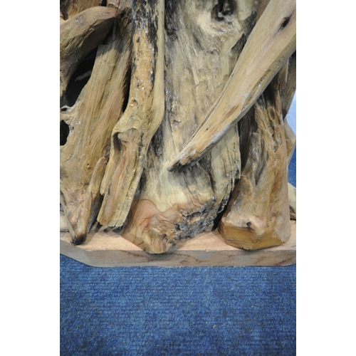 153 - A LARGE DECORATIVE DRIFTWOOD HORSE HEAD, on a plinth, height 102cm, condition report: signs of damp,... 