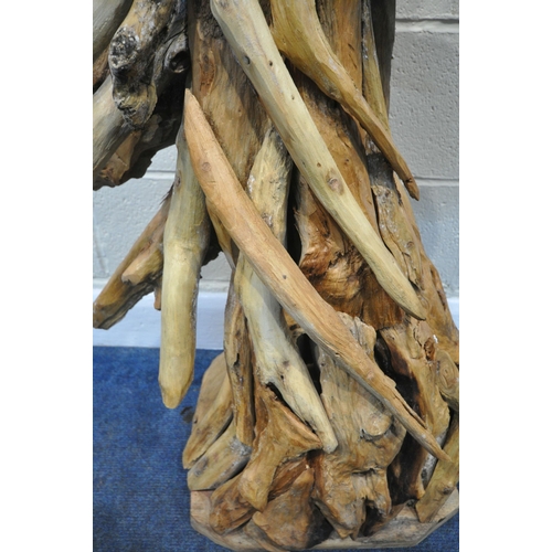 153 - A LARGE DECORATIVE DRIFTWOOD HORSE HEAD, on a plinth, height 102cm, condition report: signs of damp,... 