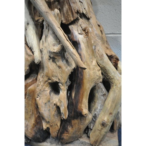 153 - A LARGE DECORATIVE DRIFTWOOD HORSE HEAD, on a plinth, height 102cm, condition report: signs of damp,... 