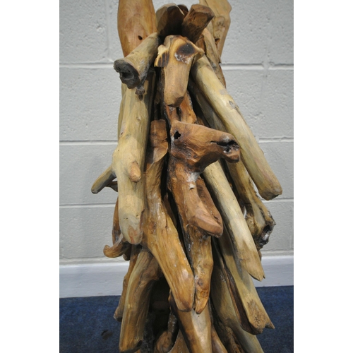 153 - A LARGE DECORATIVE DRIFTWOOD HORSE HEAD, on a plinth, height 102cm, condition report: signs of damp,... 