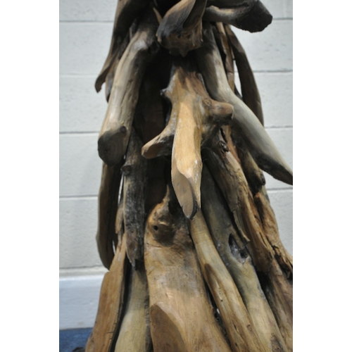 153 - A LARGE DECORATIVE DRIFTWOOD HORSE HEAD, on a plinth, height 102cm, condition report: signs of damp,... 