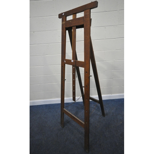 154 - A 20TH CENTURY OAK ARTIST EASEL, with a height adjustable rest, maximum height 244cm x minimum heigh... 