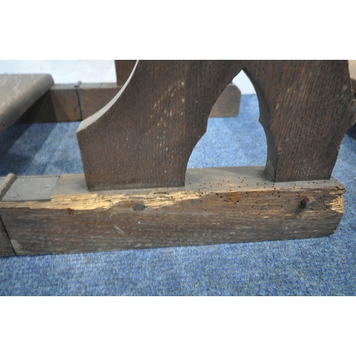 161 - TWO 20TH CENTURY OAK PRAYER KNEELERS, with sloped surfaces, a bible slot, and kneeling planks, the s... 