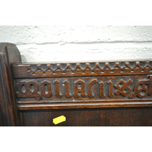 162 - A PAIR OF 20TH CENTURY OAK GLASTONBURY CHAIRS, with various carved details all over, shaped open arm... 